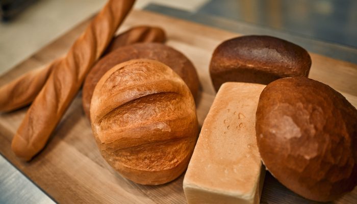 Different bread on a rustic background. bakery products. Factory bakery concept. bakery products. Healthy eating.